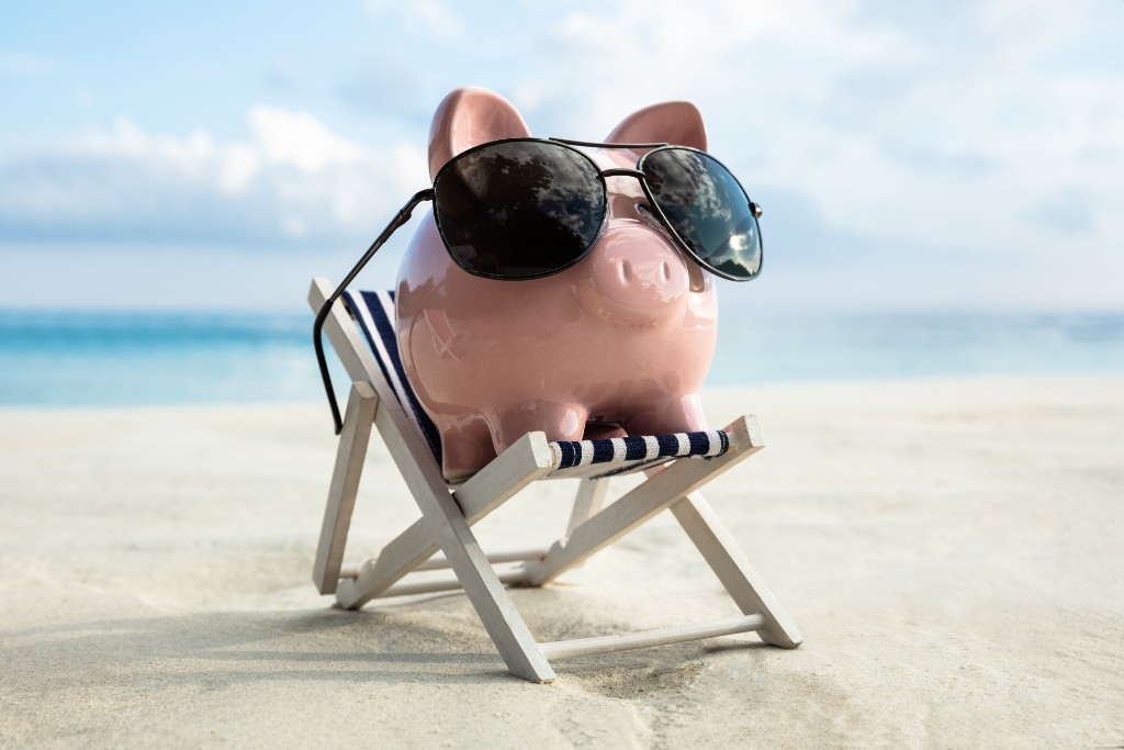 Pig Wearing Black Glasses On The Beach